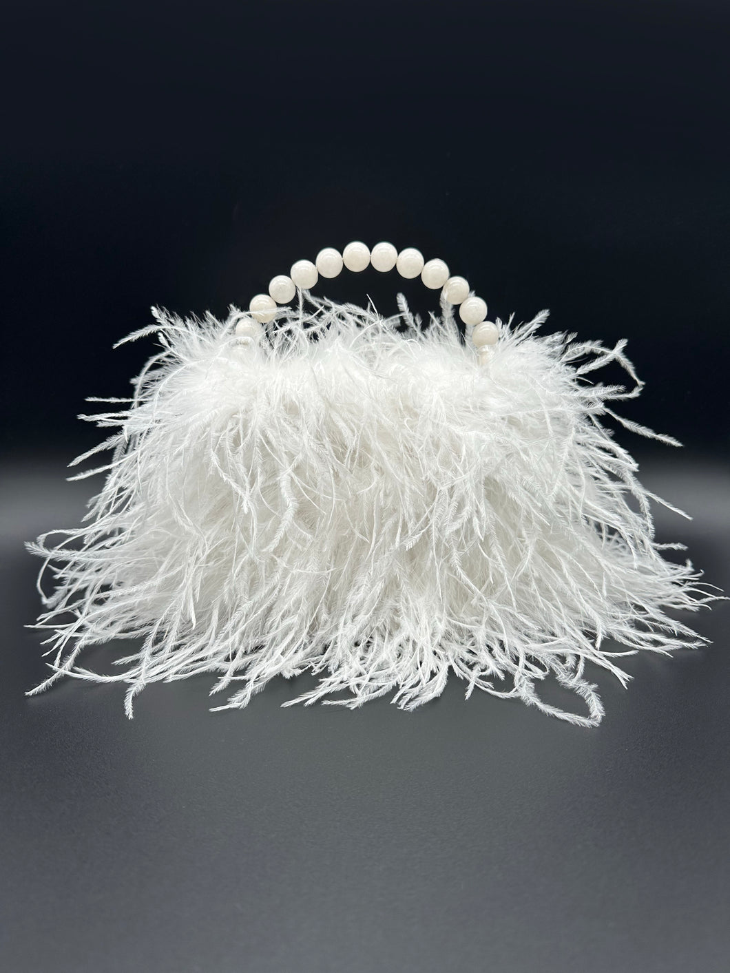 white ostrich feather bag with handle, front  side
